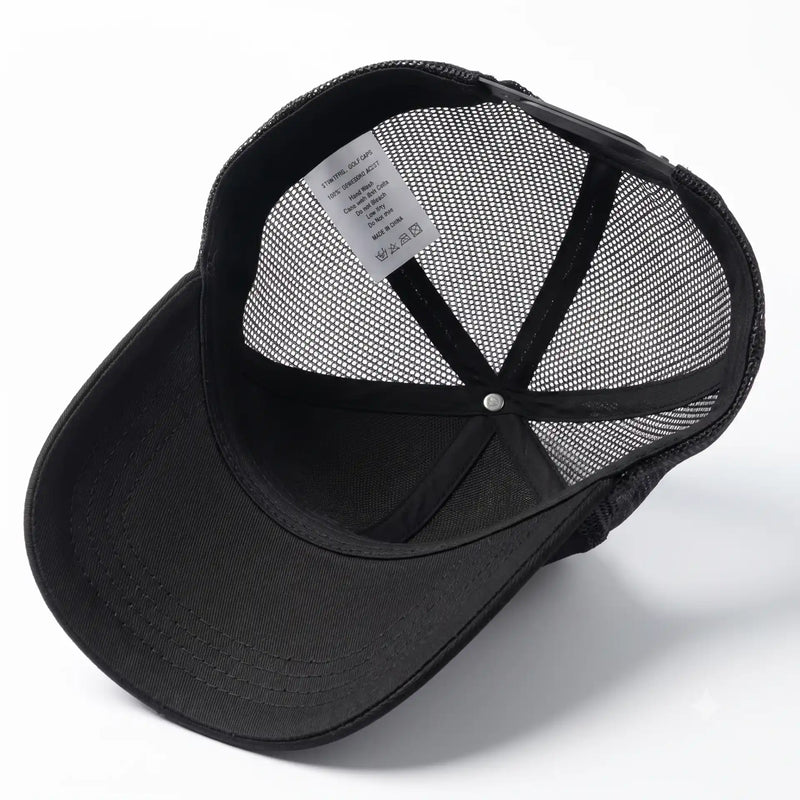 Interior view of black breathable mesh snapback cap showing inner lining