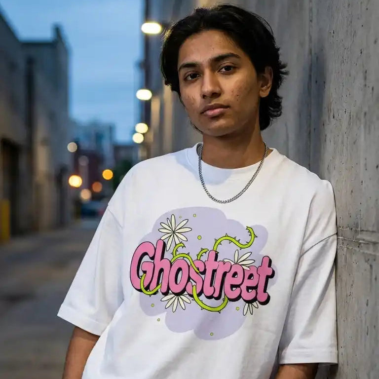 Male model wearing unisex Ghostreet white oversized t-shirt with pink pastel graphic