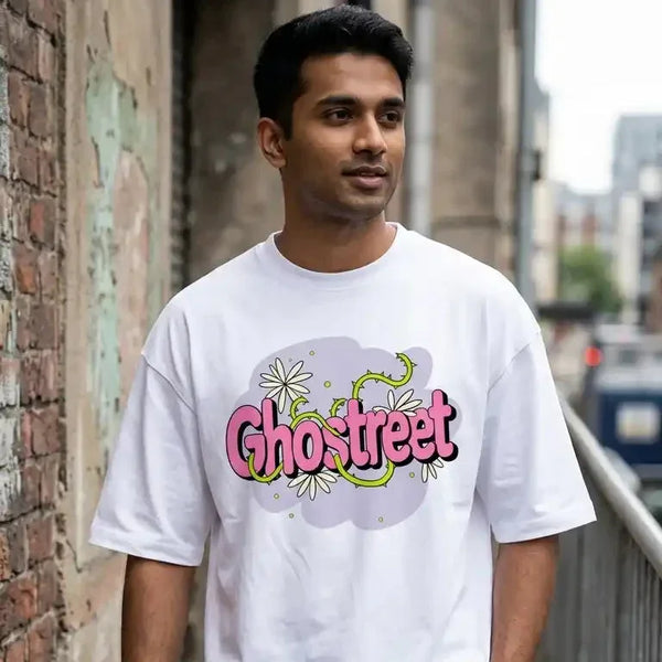 Street style shot of male model wearing Ghostreet white drop-shoulder floral vine t-shirt and cargo pants